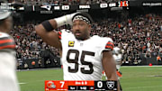 Myles Garrett reacts to Shedeur Sanders’s 52-yard throw Isaiah Bond. 