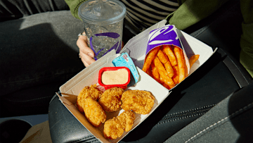 Taco Bell chicken nuggets with fries and a drink