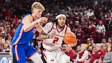 Boogie Fland drives to the basket against Thomas Haugh of Florida on January 11. The Gators won 71-63.