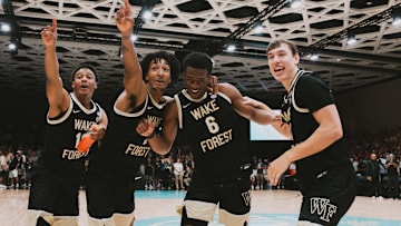 Wake Forest basketball team celebrates after beating Memphis
