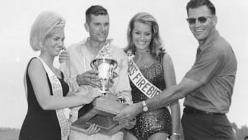 Paul Goldsmith (second from the left)wins the 1966 NASCAR Cup Series event at Bristol.