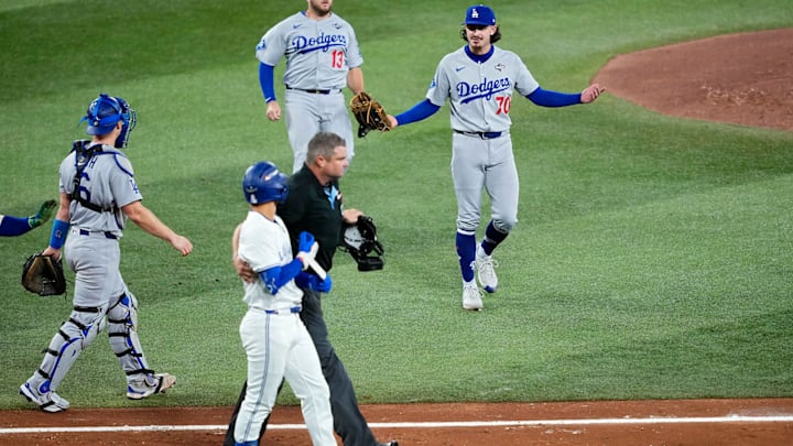 Justin Wrobleski has a few words for Andrés Giménez after hitting him with a fastball in the fourth inning of Game 7.