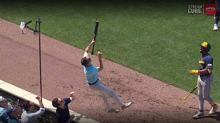 A fan helped out Brewers outfielder Sal Frelick in the top of the sixth by grabbing his bat that was stuck in the netting. | Marquee Sports