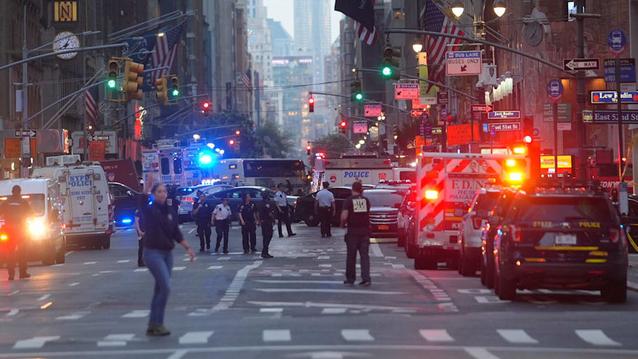 A shooting on Monday night at an office building home to NFL headquarters left four people dead.  | Selcuk Acar/Anadolu/Getty Images