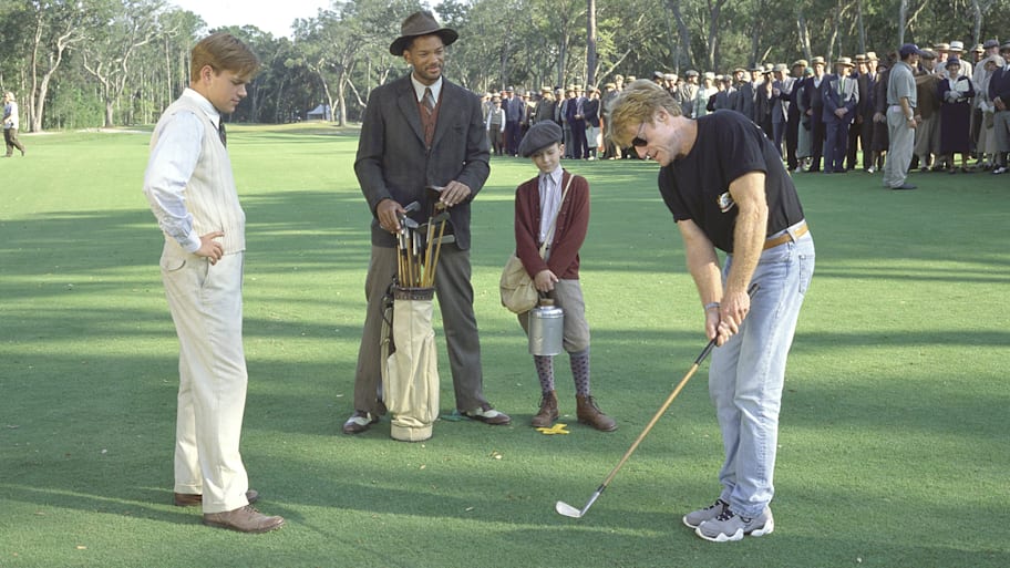 Robert Redford (right) directing on the set of “The Legend of Bagger Vance” with actors Matt Damon (left) and Will Smith.