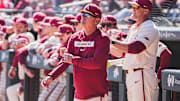 Arkansas coach Dave Van Horn looks on from the dugout against the Portland Pilots. The Razorbacks won the third game of the series 5-3. 