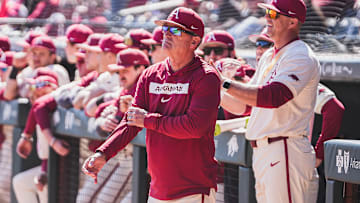 Arkansas coach Dave Van Horn looks on from the dugout against the Portland Pilots. The Razorbacks won the third game of the series 5-3. 