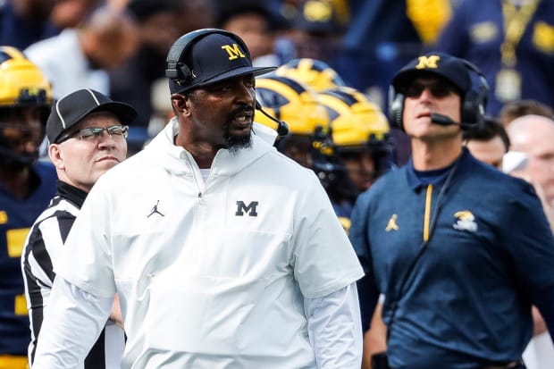 Michigan former defensive backs coach Steve Clinksdale, head coach Jim Harbaugh targeted by NCAA over alleged violations