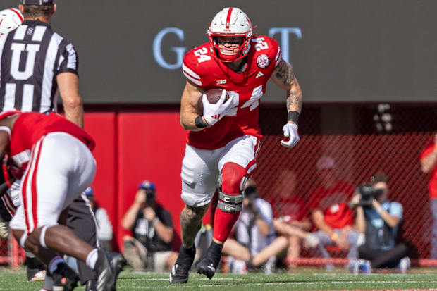 Nebraska tight end Thomas Fidone turns up field after catching a short pass against Rutgers.