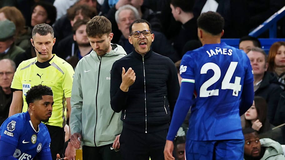 Liam Rosenior gives instructions to Chelsea captain Reece James.
