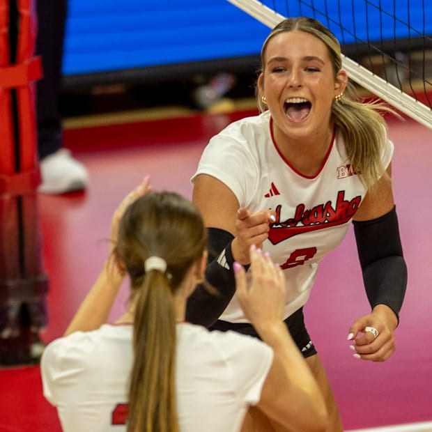 Nebraska middle blocker Kenna Cogill reacts after a kill during the Red-White Scrimmage on Saturday.
