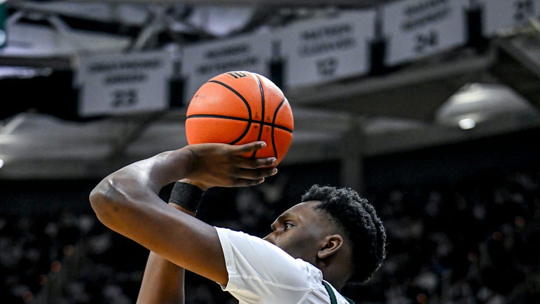 Michigan State's Xavier Booker, makes a 3-pointer against Indiana 