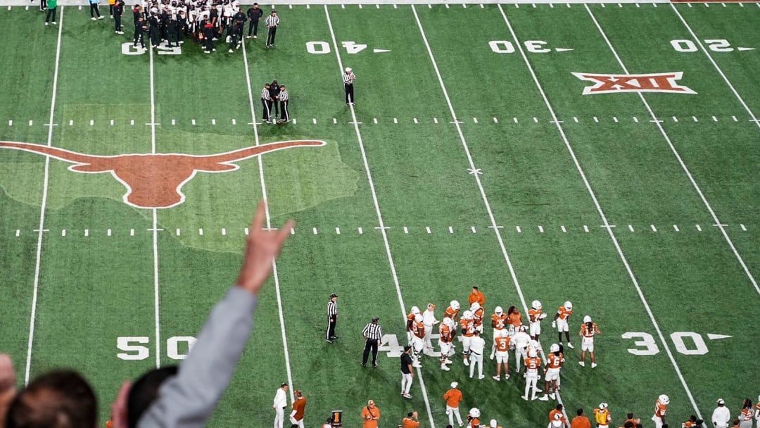 Texas fans cheer during the game against Texas Tech at Darrell K Royal Texas Memorial Stadium on Friday, Nov. 24, 2023.