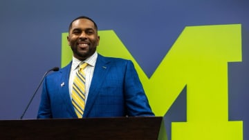 Sherrone Moore, Michigan   s new head coach, smiles as he speaks in front of family, media and University of Michigan faculty members during a press conference inside the Junge Family Champions Center in Ann Arbor on Saturday, Jan. 27, 2024.