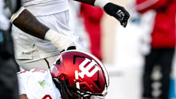 Michigan State's Tommy Schuster, right, is sacked by Indiana's Mikail Kamara during the third quarter on Saturday, Nov. 2, 2024, at Spartan Stadium in East Lansing.