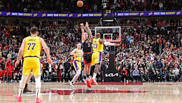 Josh Giddey nails a half-court shot in the Bulls' 119-117 win over the Lakers on March 27.
