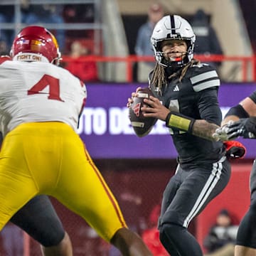 Nebraska quarterback TJ Lateef drops back to pass against USC.