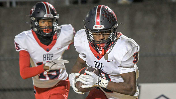 Belton-Honea Path's Marquise Henderson (3) scores a touchdown against DW Daniel High on Nov. 24, 2023.