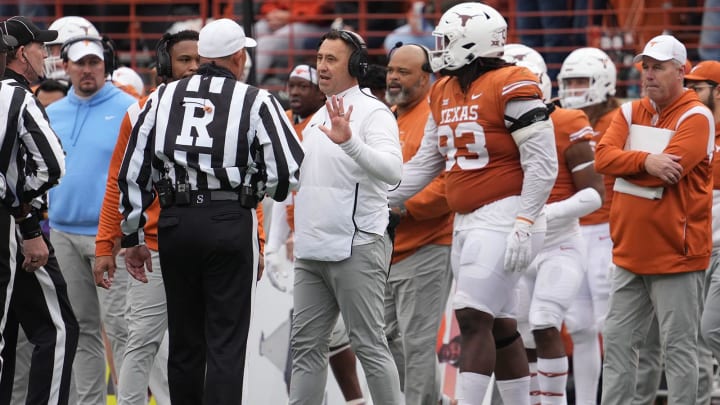 Texas Longhorns head coach Steve Sarkisian speaks to the referees.