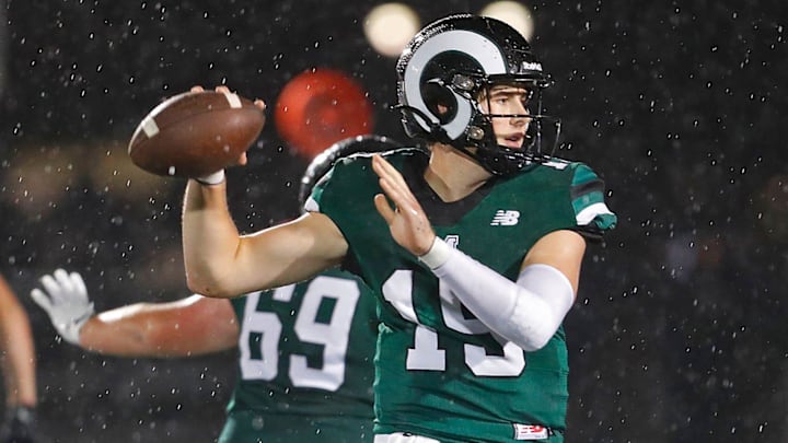 Rams quarterback Tor Maas sets to pass.

The Marshfield Rams hosted the Bridgewater Trojans Raynham on the gridiron Friday, September 20, 2024