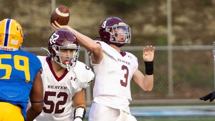 Beaver Area quarterback Travis Clear (3) fires a pass downfield during the KDKA Kickoff Classic between the Bobcats and Westinghouse Saturday night at the Wolvarena.