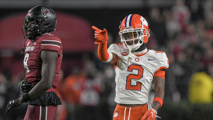 Nov 25, 2023; Columbia, South Carolina, USA; Clemson Tigers cornerback Nate Wiggins (2) smiles after breaking up a pass to South Carolina wide receiver Nyck Harbor (8) during the fourth quarter at Williams-Brice Stadium.  Clemson won 16-7. Mandatory Credit: Ken Ruinard-USA TODAY Sports