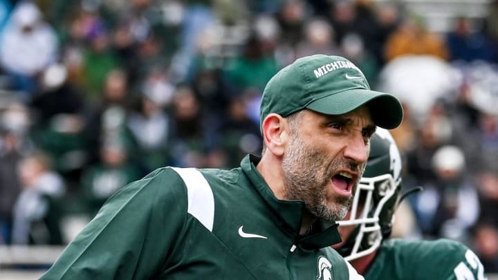 Michigan State's defensive coordinator Joe Rossi works with the linebackers during the Spring