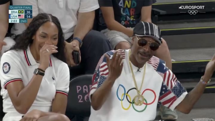 Snoop Dogg and Las Vegas Aces star A'ja Wilson share a laugh while watching USA Basketball play Brazil in the Olympic quarterfinals.