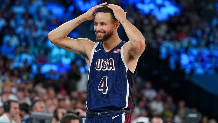 Steph Curry celebrates after draining a three-pointer during the United States' win over France in the basketball gold medal game.