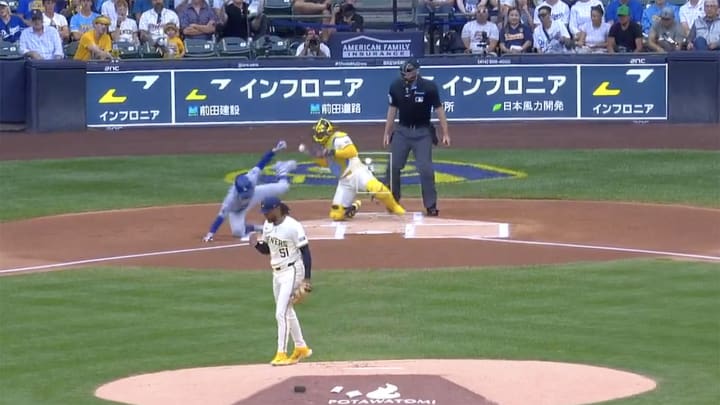 Freddie Peralta strikes out Mookie Betts in the first inning of the Brewers-Dodgers game at American Family Field.