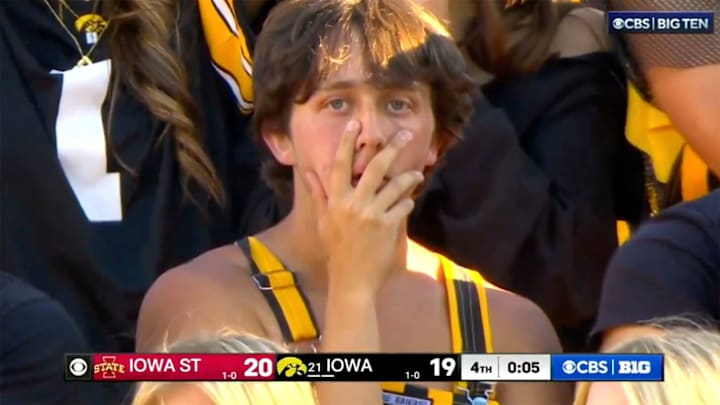 An Iowa fan takes in the Hawkeyes' 20–19 loss to Iowa State on Saturday.