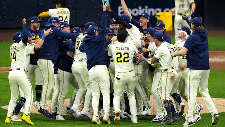 The Brewers celebrate on the field after winning Game 5 of the NLDS against the Cubs at American Family Field. The Brewers celebrate on the field after winning Game 5 of the NLDS against the Cubs at American Family Field.