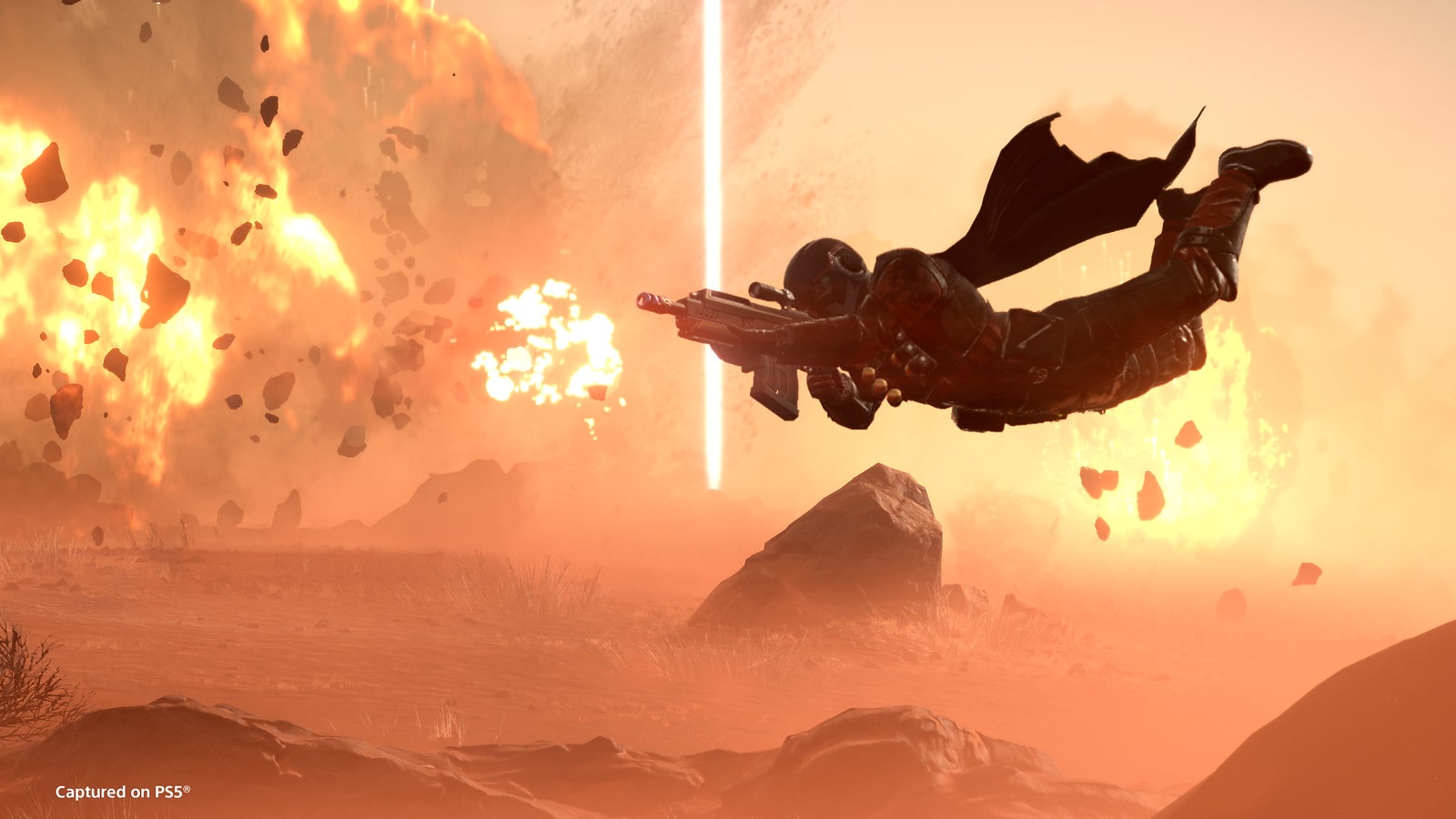Helldivers 2 screenshot of a Helldiver flying through the air amid several explosions.