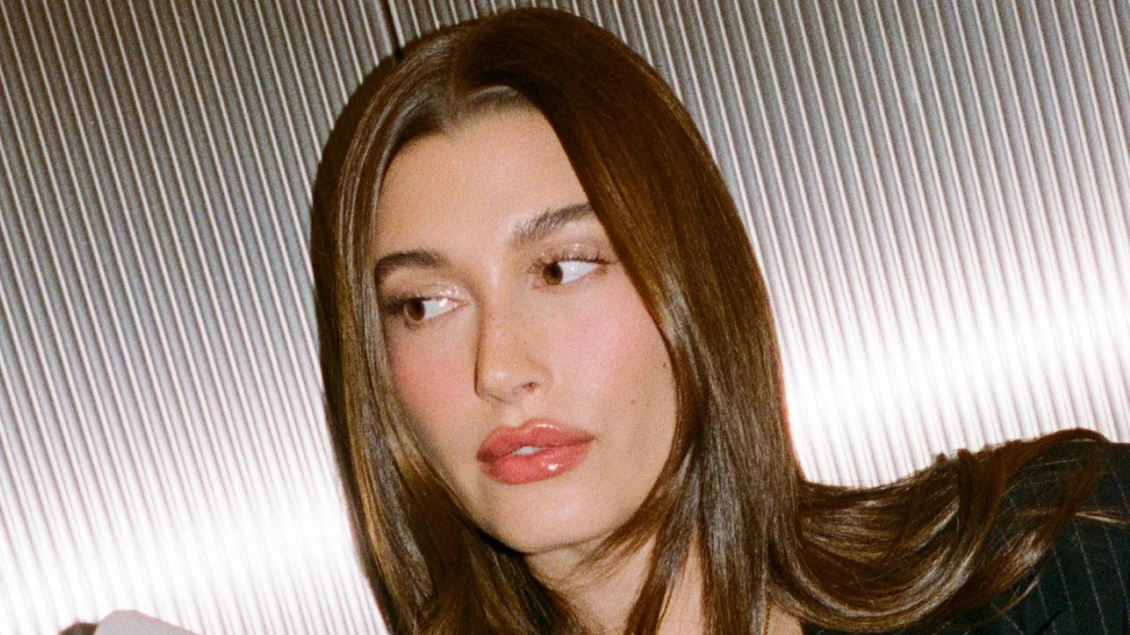 Hailey Bieber Steals the Show at LA Rhode Pop-Up in Deep Brown Leather Mini  Dress