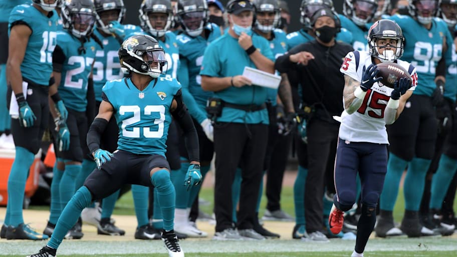 Houston Texans wide receiver Will Fuller (15) pulls in a sideline pass while in front of the Jaguars bench while being defended by Jacksonville Jaguars cornerback C.J. Henderson (23) during third-quarter action in 2020. | Bob Self/Florida Times-Union via Imagn Content Services, LLC