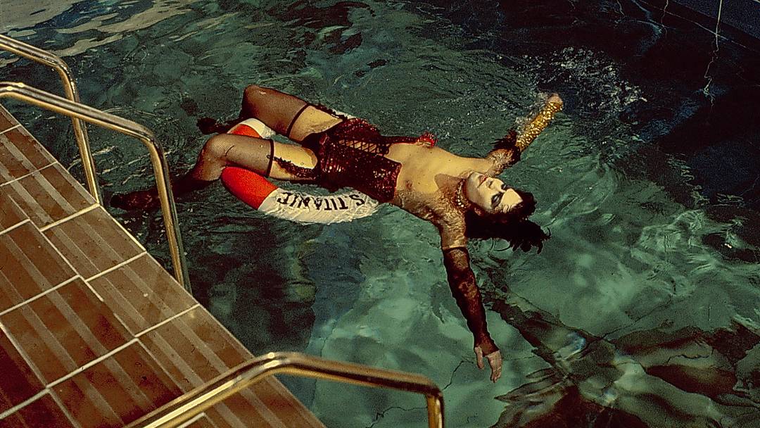 Frank N Furter in the pool in 'The Rocky Horror Picture Show' Frank N Furter in the pool in 'The Rocky Horror Picture Show'