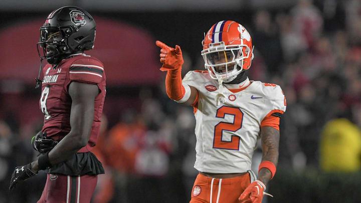 Nov 25, 2023; Columbia, South Carolina, USA; Clemson Tigers cornerback Nate Wiggins (2) smiles after breaking up a pass to South Carolina wide receiver Nyck Harbor (8) during the fourth quarter at Williams-Brice Stadium.  Clemson won 16-7. Mandatory Credit: Ken Ruinard-USA TODAY Sports