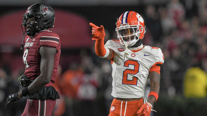 Nov 25, 2023; Columbia, South Carolina, USA; Clemson Tigers cornerback Nate Wiggins (2) smiles after breaking up a pass to South Carolina wide receiver Nyck Harbor (8) during the fourth quarter at Williams-Brice Stadium.  Clemson won 16-7.