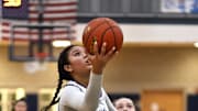 Alyssa Hopps takes a lay up for two points.

The Quincy High Presidents hosted the Hopkinton Hillers in girls MIAA basketball playoffs on Friday, March. 1, 2024