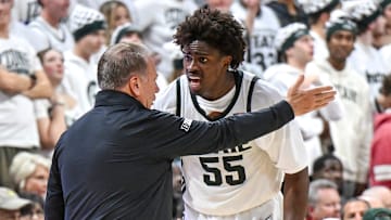 Michigan State's Coen Carr, right, pleads his case to coach Tom Izzo during the second half against Arkansas on Saturday, Nov. 8, 2025, at the Breslin Center in East Lansing.