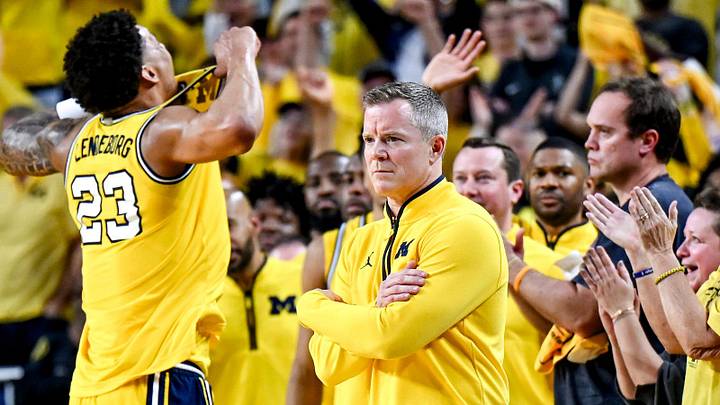 Michigan's head coach Dusty May looks on as Yaxel Lendeborg, left, celebrates during the second half in the game against Michigan State on Sunday, March 8, 2026, at the Crisler Center in Ann Arbor.