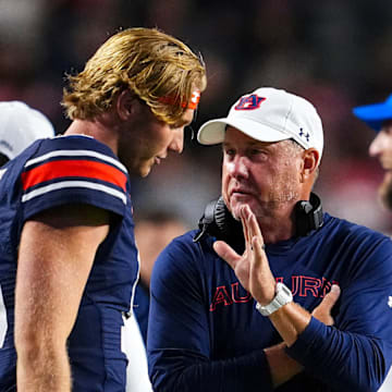 Auburn Tigers Quarterback Hank Brown and head coach Hugh Freeze during the game against the  New Mexico Lobos 