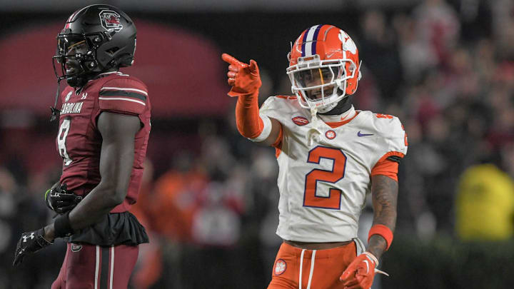 Nov 25, 2023; Columbia, South Carolina, USA; Clemson Tigers cornerback Nate Wiggins (2) smiles after breaking up a pass to South Carolina wide receiver Nyck Harbor (8) during the fourth quarter at Williams-Brice Stadium.  Clemson won 16-7. Mandatory Credit: Ken Ruinard-USA TODAY Sports