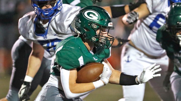 Grafton back #20 Finn Gilmore looks for an open path.

The Scituate Sailors defeated the Grafton Gators to advance to the MIAA Division 4 state championship on Friday Nov. 17, 2023