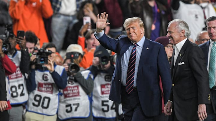 Nov 25, 2023; Columbia, South Carolina, USA; Former President Donald Trump with South Carolina Governor Henry McMaster during a game between the Clemson Tigers and the South Carolina Gamecocks at Williams-Brice Stadium. Mandatory Credit: Ken Ruinard-Imagn Images