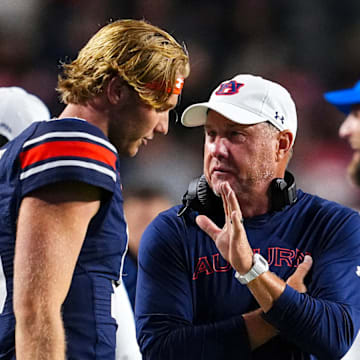 Auburn Tigers Quarterback Hank Brown and head coach Hugh Freeze during the game against the  New Mexico Lobos 