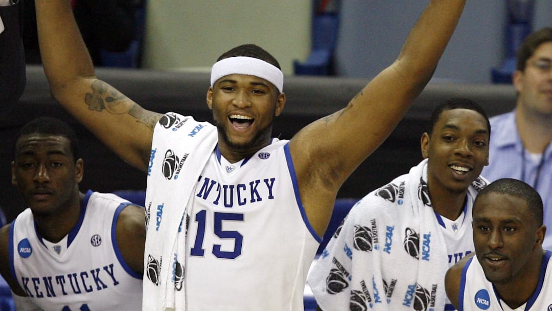 Mar 18, 2010; New Orleans, LA, USA; Kentucky Wildcats guard John Wall (11) and forward DeMarcus Cousins (15) and forward Patrick Patterson (54) react from the bench near the end of the game against the East Tennessee Buccaneers in the first round of the 2010 NCAA mens basketball tournament at the New Orleans Arena. Kentucky won 100-71.Mandatory Credit: Crystal LoGiudice-Imagn Images