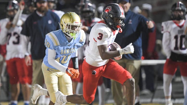 Before he dashes off to Clemson next year, Belton-Honea Path running back Marquise Henderson (3) will seek to rush for another 2,300+ yards this season. (Above) He ran by DW Daniel junior Tremaine Davis, Jr. (10) for a touchdown during the second quarter of the South Carolina High School League (SCHL) Class 3A state semifinal on, November 24, 2023.