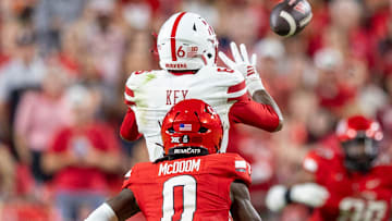 Nebraska wide receiver Dane Key prepares to snag a pass for a 15-yard gain against Cincinnati.