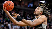 Orchard Lake St. Mary's Trey McKenney scores against East Lansing during the third quarter in the Division 1 state semifinal on Friday, March 14, 2025, at the Breslin Center in East Lansing.